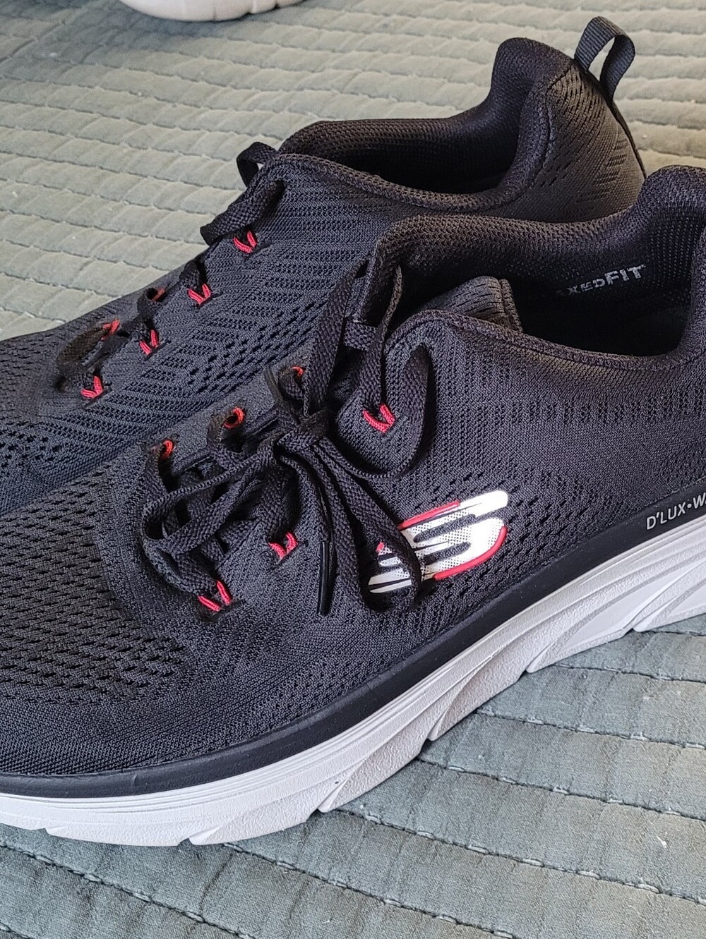 Skechers Black Knit Slip-On Sneakers with White Sole and Red Accents Like New